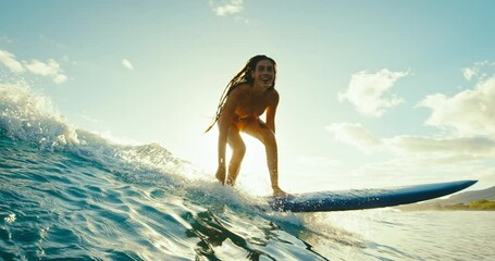 Beautiful girl surfing ocean wave at sunset, beautiful ocean wave, surf lifestyle, cinematic slow motion, shot on RED camera - Powered by Adobe