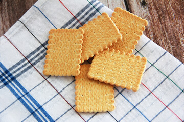 salty square cracker and sweet cookies