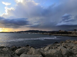 dark coulds at the beach