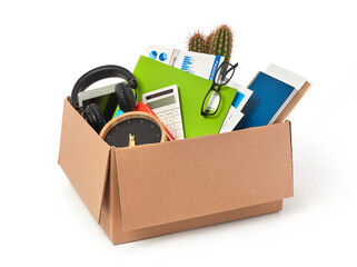 Cardboard box full with office supplies