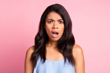 Fototapeta premium Portrait of impressed brunette lady open mouth wear blue top isolated on pastel pink color background