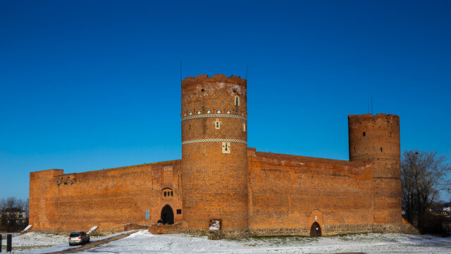 Medieval brick castle in Ciechanów, Poland. Deep, blue sky over the castle, natual light at sunny condition