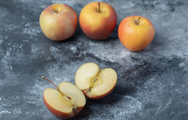 Set of fresh red apples on a marble background