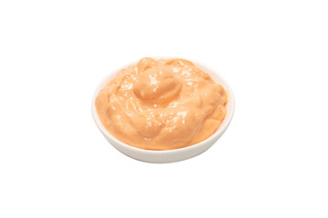 Sauce in a bowl isolated on white.