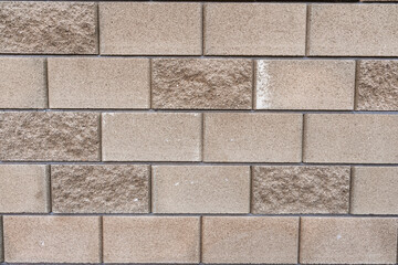 Obraz premium Gray fence made of brick wall