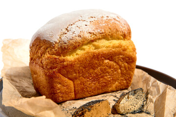 CornBread on white table. White table and pink wall in sunlight with hard shadow. Summer day food concept.