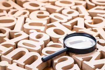 Magnifying on English Wood Alphabets