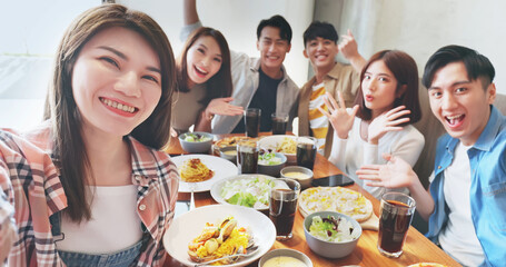 friends take selfie in restaurant