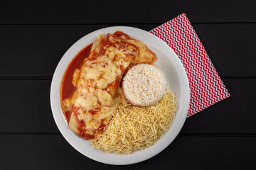 Beef pancake with rice, potato straw and salad