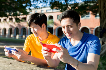 young students use smartphone
