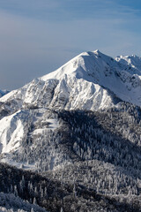 Obraz premium Mountain ridge covered in snow, Bohinj 