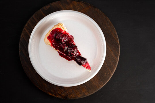 cheesecake with red fruit sauce