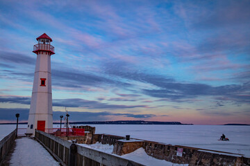 Wawatam lighthouse during winter in St. Ignace, Michigan.