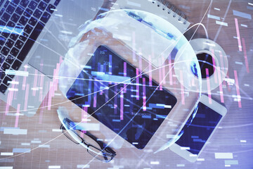 Multi exposure of forex graph hologram over desktop with phone. Top view. Mobile trade platform concept.