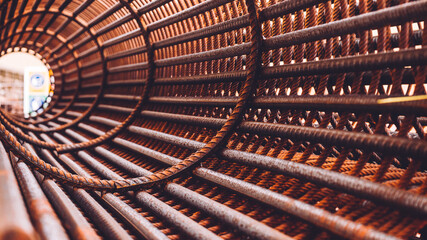 reinforcement concrete and plastic orange net. Inside view of rebar for reinforced hole in the...
