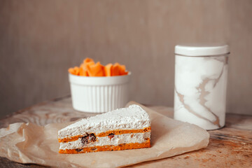 A piece of carrot cake. Carrot cake. A healthy dessert without gluten, no sugar and milk.chatty carrots and sliced. Useful snack, carrot snacks. Dessert on coconut milk from carrots.