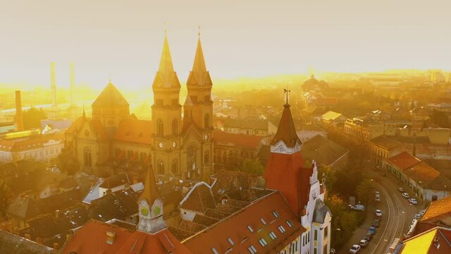 Aerial view of the Millennium Church with old and new buildings in Timisoara city - Romania; CCA. 2020 - during the COVID-19 pandemic.