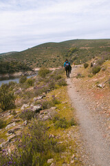 Fototapeta na wymiar Young tourist walking on the national park of Monfrague Caceres, Extremadura, Spain, Europe