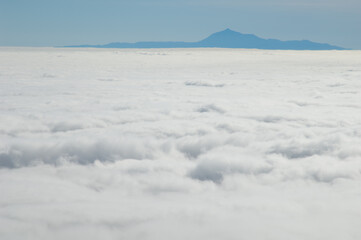 Sea of clouds and island of Tenerife with the Teide peak from La Palma. Canary Islands. Spain.