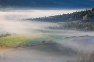fog in a mountain valley - obrazy, fototapety, plakaty