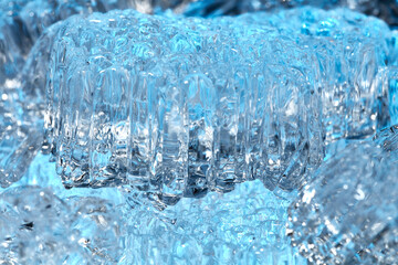 Naklejka na ściany i meble Wasser ist zu kleinen Eiskristallen gefroren die übereinander liegen.