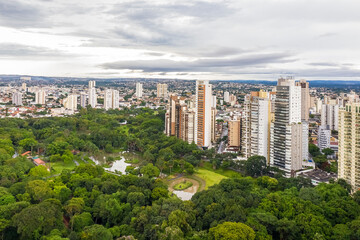 Obraz premium Zoological park of Goiania next to the lake of roses, Goias, Brazil, residential buildings in the background