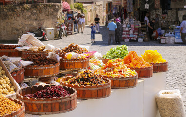 display of variations of  exotic dehydratated fruits in a middle eastern square