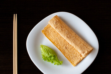 products for a sandwich on a white plate