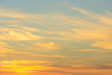 Obraz premium sky background during sunrise with orange hues
