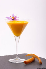Pumpkin and orange cream, decorated with saffron flower