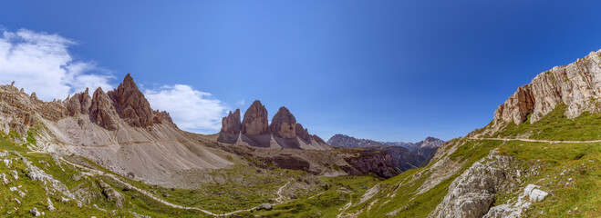 Super panorama of Tre Cime Natural Park with famous three peak of Tre Cime di Lavaredo. South Tyrol, Italy