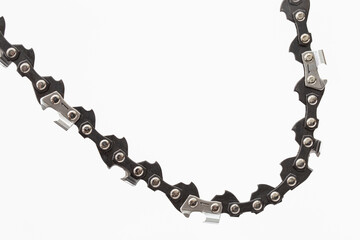 Fragment of chain for a chainsaw, isolated on the white background