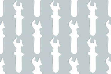 Adjustable wrench seamless pattern. Background from a metal adjustable wrench.