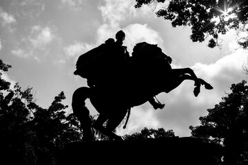 Silhouette of the statue of the Liberator Simon Bolivar in the central Plaza of Caracas