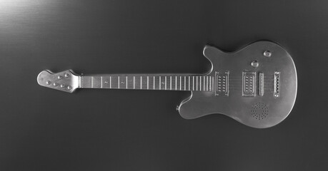 silver guitar isolated on silver background