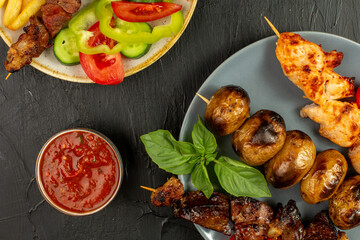 Kebap, roasted meat and vegetables on grill