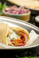 Kebap wrapped in a very thin pita or lavash 
