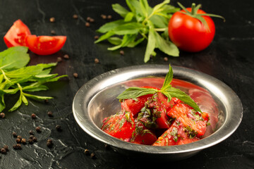 Tomatoes salad with greens and mint 