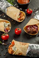 Kebap wrapped in a very thin pita or lavash 