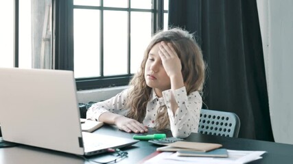 Exhausted or sick upset irritated school student studying alone feeling headache. Tired depressed bored teenage girl worried about problem in children education concept.