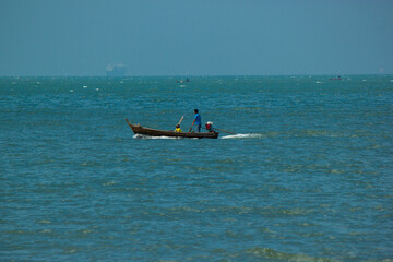 Fototapeta na wymiar A small fishing boat at sea