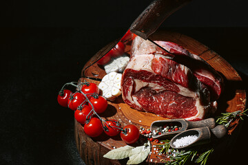 butcher knife and meat on a cutting board