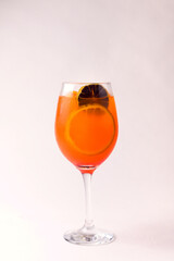 Fruit mixology with vodka and lemon slice on white background. Warm colored cocktails. Colorful cocktail. Cocktail concept.