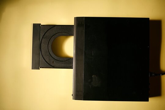 close up of  vcd or dvd player with open tray