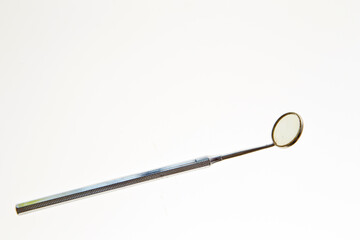 Dental treatment tools on white background