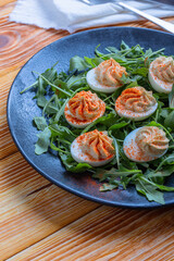 Keto deviled eggs with creamy filling and smoked paprika