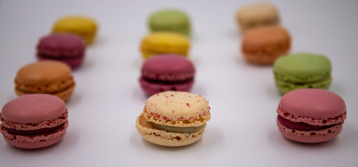Macaron colorfuls design on white blurred background