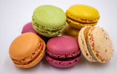 Macarons Macaroon Cookie Dessert from France in a Heap isolated on a white background