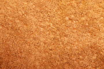 Knitting Wool Texture. Background texture of pattern knitted fabric made of cotton or wool closeup