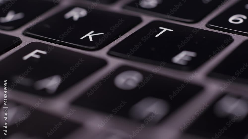 Poster close up of computer keyboard buttons. action. laptop keyboard with russian and english layout, conc